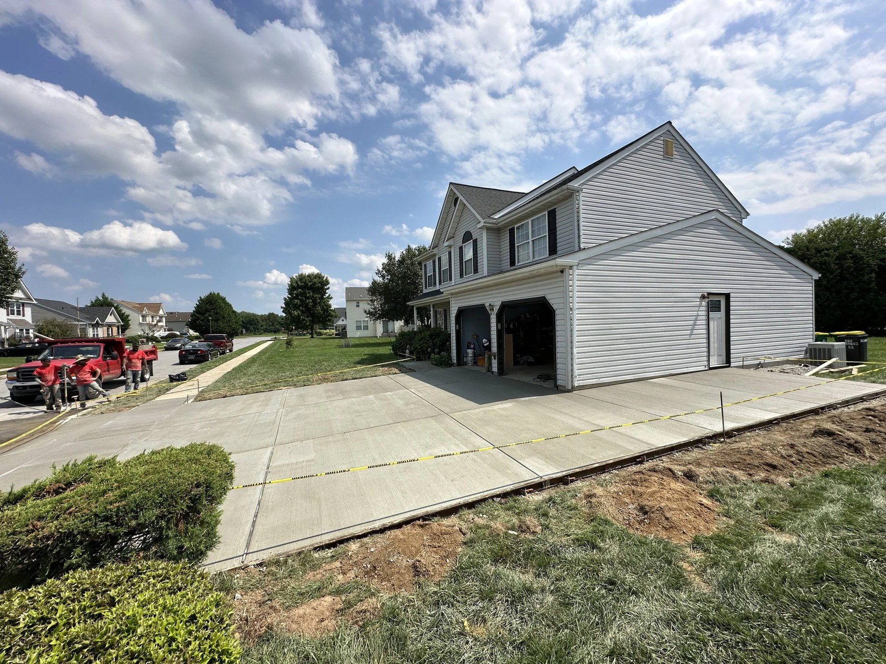 Concrete driveway replacement in a residential neighborhood in New Castle County, DE