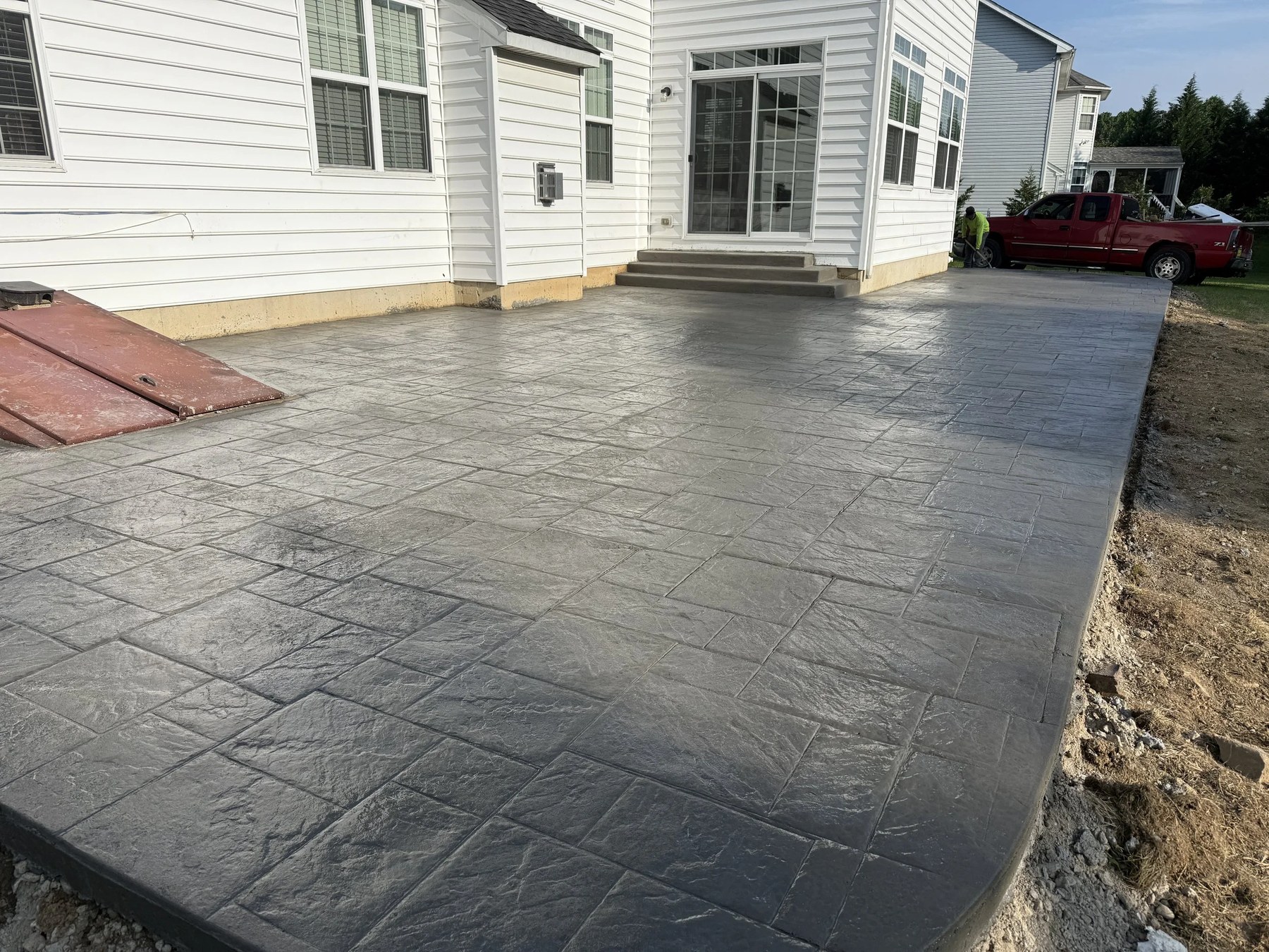 Stamped concrete patio with running-bond pattern installed in New Castle County, DE